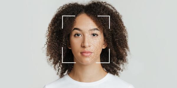 Biometric facial recognition of calm young person.